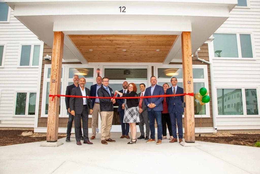 Boston Financial team at a ribbon cutting